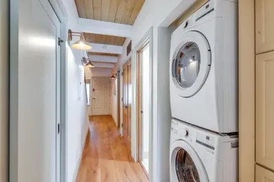 a laundry room with a washer and dryer at 8 Mi to Northstar Slopes Tahoe Gem with Fireplace in Kings Beach
