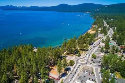 an aerial view of a park next to the water at Spacious Tahoe Hot Tub and Beach in Kings Beach