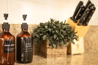 two bottles of alcohol sitting on top of a counter at Lakeland Village 2 Bed Condo Pool View in South Lake Tahoe