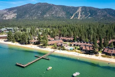 an aerial view of a beach with boats in the water at Lakeland Village 2 Bed Condo Pool View in South Lake Tahoe