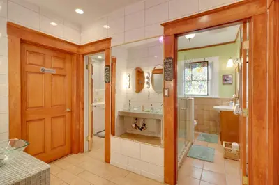 a bathroom with a shower and a sink at Steps to Truckee River Walk Rose Cottage in Reno