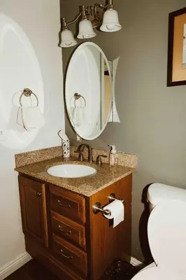 a bathroom with a sink and a mirror at 3B Hot Tub, 4mi from Sequoia, Arcade Games, Foosball in Three Rivers
