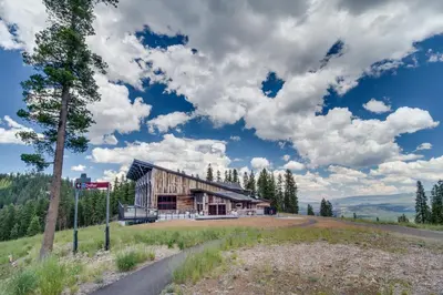 a house on a hill with a road next to it at Getaway at Gold Bend in Ponderosa Fairway Estates