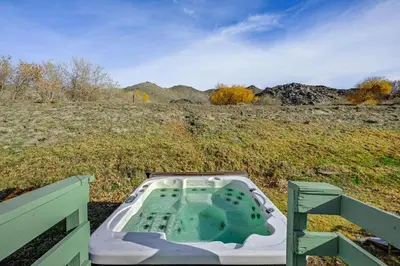 a hot tub in the middle of a field at Mtn-View Weldon Home Walk to Pacific Crest Trail in Weldon