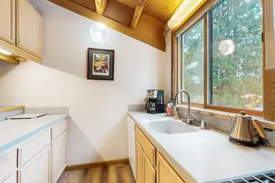 a kitchen with a sink and a window at Northstar Retreat in Kingswood Estates