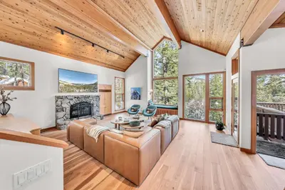 a living room with a couch and a fireplace at Pet-Friendly Home, Deck, 1 Mile to Alpine Meadows in Alpine Meadows