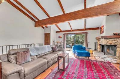 a living room with a couch and a fireplace at 3-Level Incline Village Retreat with Fireplace in Incline Village
