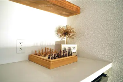 a chess board on a counter in a room at Stunning Waterfront 3BR Retreat - Perfect Getaway in Discovery Bay