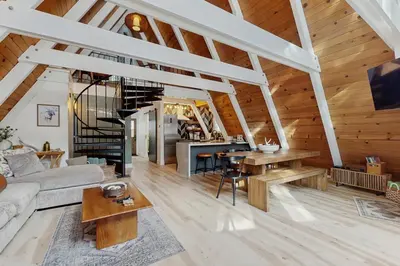 a living room with a couch and a table at Elati Escape in South Lake Tahoe