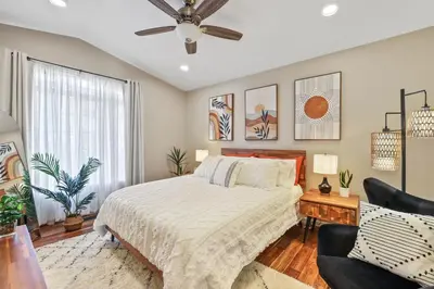 a bedroom with a bed and a ceiling fan at Spacious Cozy and Furnished Bedroom Private Bathroom, Close to Everything in Reno