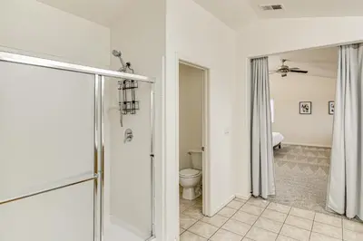 a bathroom with a shower and a toilet at Family Reno Home with Game Room! 28 Mi to Ski Resort in Reno