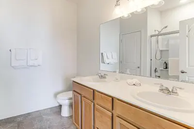 a bathroom with a sink and a toilet at 4 Mi to Dtwn Family-Friendly Townhome in Reno in Reno