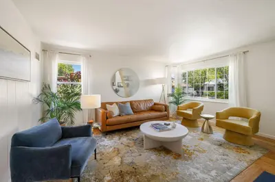 a living room with a couch and two chairs at Cozy Reno Midtown Retreat Fire Pit & Parking in Reno