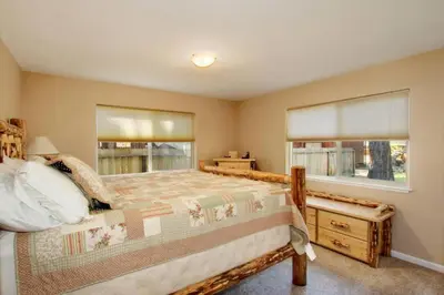 a bedroom with a large bed and a window at Ormsby House 1489O in South Lake Tahoe