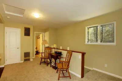 a dining room with a table and four chairs at Ormsby House 1489O in South Lake Tahoe