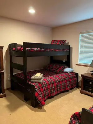 a bedroom with two bunk beds in a room at 2272L The Lupine Lodge in South Lake Tahoe