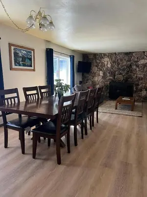 a dining room with a wooden table and chairs at 121M The Meadow Drive in Stateline