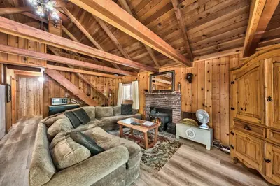 a living room with a couch and a fireplace at Hank Monk Chalet 2730HM in South Lake Tahoe