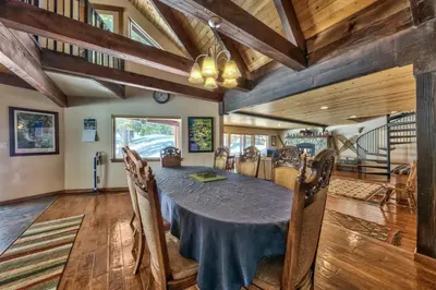 a dining room with a table and chairs at Tall Pines in South Lake Tahoe