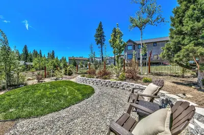 a patio with two chairs and a yard at 1376MD Angora View in South Lake Tahoe