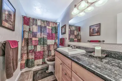 a bathroom with a sink and a toilet and a shower at Peace of Heaven 2566C in South Lake Tahoe