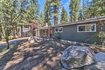 a house with a large rock in front of it at Peace of Heaven 2566C in South Lake Tahoe