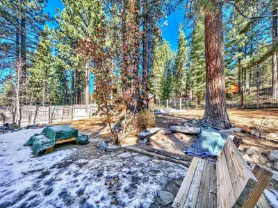 a picnic table and a tent in the snow at 2556H Lazy Bear's Den in South Lake Tahoe