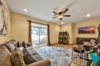 a living room with a couch and a ceiling fan at 1213GB Golden Bear Tahoe Home in South Lake Tahoe