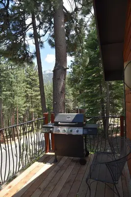 a grill sitting on a deck on a porch at 2375S Sierra house Retreat in South Lake Tahoe