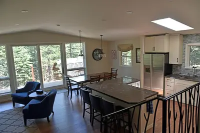 a kitchen with a table and chairs in a room at 2375S Sierra house Retreat in South Lake Tahoe