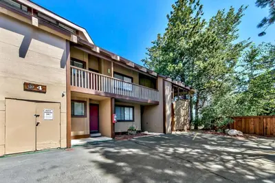 an apartment building with a driveway in front of it at 920 Bal Bijou in South Lake Tahoe