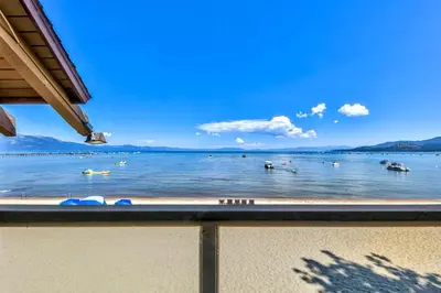 a view of a beach with boats in the water at 920 Bal Bijou in South Lake Tahoe
