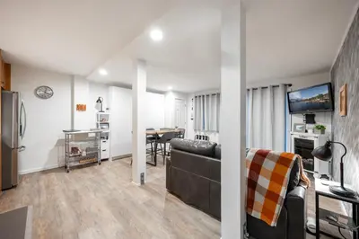 a living room with a couch and a table at Stunning Deluxe King Studio #124 at Donner Lake Village in Truckee
