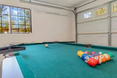 a billiard room with a pool table at Yosemite Wooded Hills, Pool Table, Fitness, Views in Oakhurst
