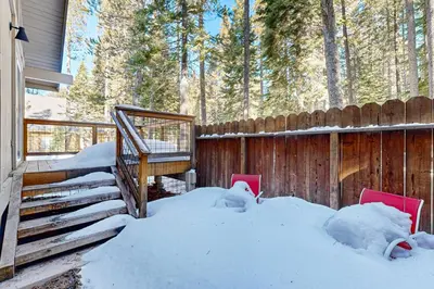 a pile of snow next to a fence and stairs at Less Than 2 Mi to Tahoe Donner Ski Resort Serene Retreat in Armstrong