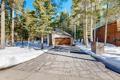 a driveway leading to a house in the snow at Less Than 2 Mi to Tahoe Donner Ski Resort Serene Retreat in Armstrong