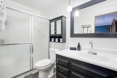 a bathroom with a toilet and a sink and a shower at Mariposa home, Yosemite retreat, deer watching, family friendly in Mariposa