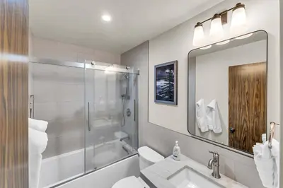 a bathroom with a shower and a toilet and a sink at Lake Tahoe Getaway Close to Beach & Ski Slopes in Tahoe City