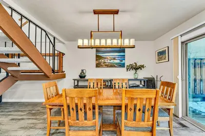 a dining room with a wooden table and chairs at Lake Tahoe Getaway Close to Beach & Ski Slopes in Tahoe City
