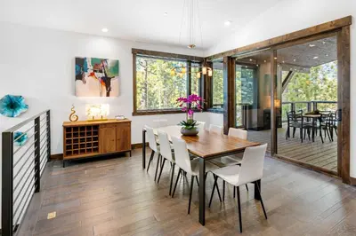 a dining room with a table and chairs at Luxurious Truckee Rental Hot Tub and Valley Views in Truckee