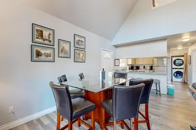 a dining room with a table and chairs at Serendipity in Groveland
