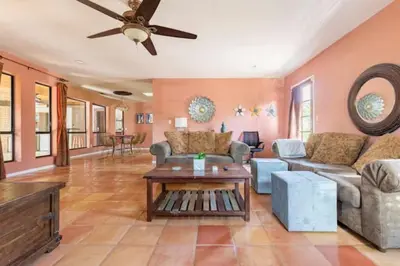 a living room with a couch and a table at Happy Hours - Beautiful Quiet Comfortable Suite #3 in Visalia