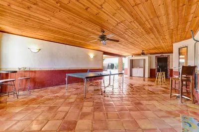 a large room with a table and chairs at Happy Hours - Beautiful Quiet Comfortable Suite #3 in Visalia