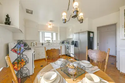 a kitchen and dining room with a table and chairs at 19 Mi to Sequoia Natl Park Mtn-View Woodlake Gem in Woodlake