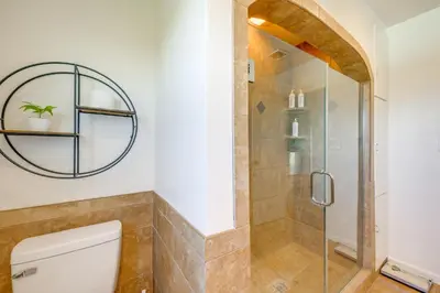 a bathroom with a shower and a toilet at 19 Mi to Sequoia Natl Park Mtn-View Woodlake Gem in Woodlake