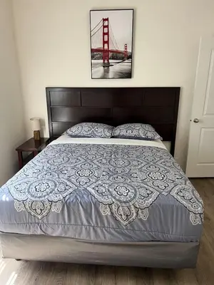 a bedroom with a bed with a golden gate bridge at Brand New Scenic Sequoia House in Three Rivers