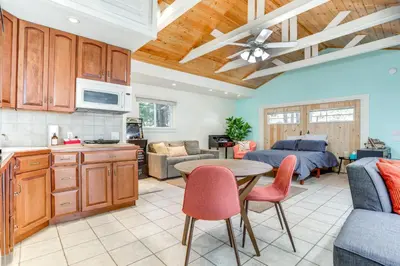 a kitchen and living room with a bed and a table at Drive to Major Parks Nature Getaway in West Point in West Point