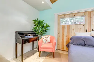 a bedroom with a bed and a desk and a chair at Drive to Major Parks Nature Getaway in West Point in West Point