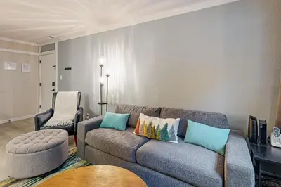 a living room with a couch and a chair at Lakeside Life in Tahoe Vista