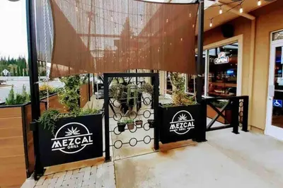 a store front with a sign for azaaq at Artist's Condo with 2 Bedroom & Arcade in Sacramento